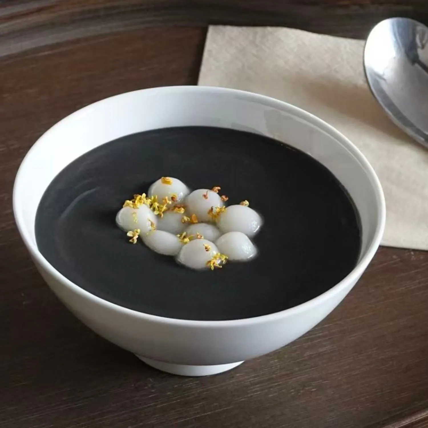 Creamy black sesame soup with rice balls and osmanthus at K House, a Chinese Restaurant in Columbus