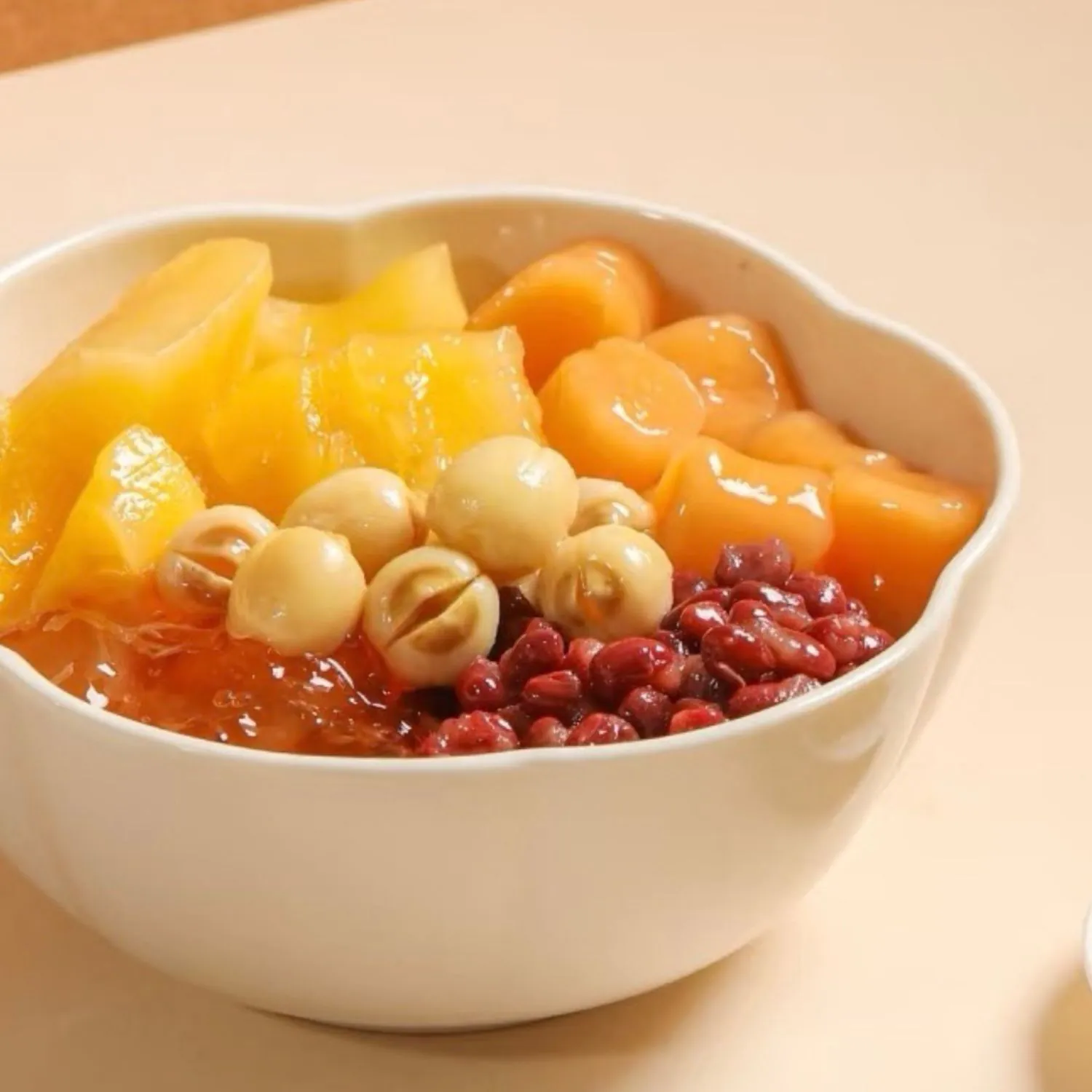 Sweet bowl with mango, lotus seeds, red bean and peach gum at K House, a Chinese Restaurant in Columbus